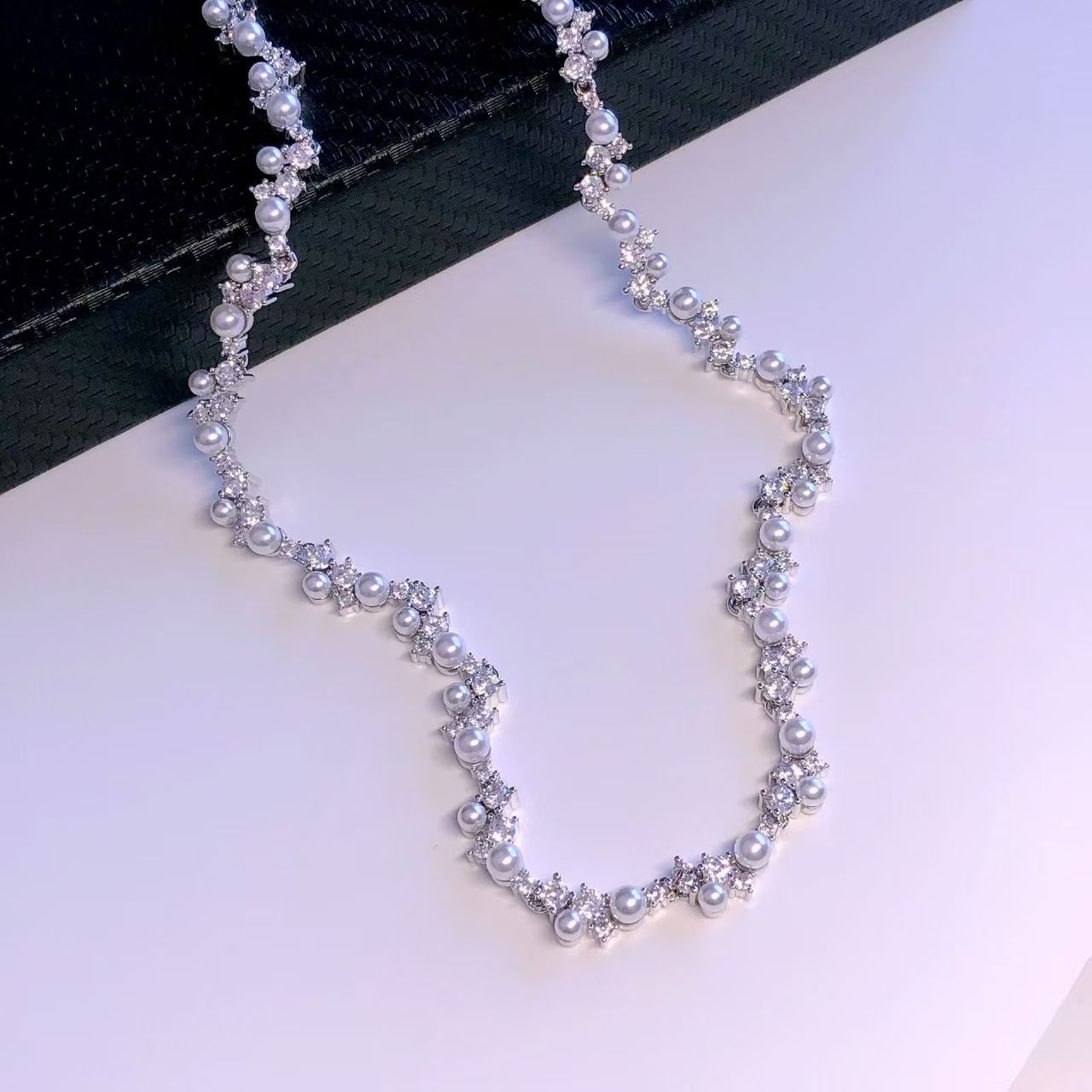 Pearl and diamond collarbone necklace
