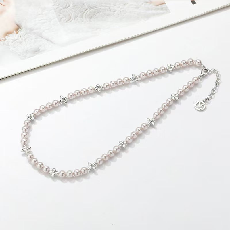 Pearls with a four-leaf clover necklace