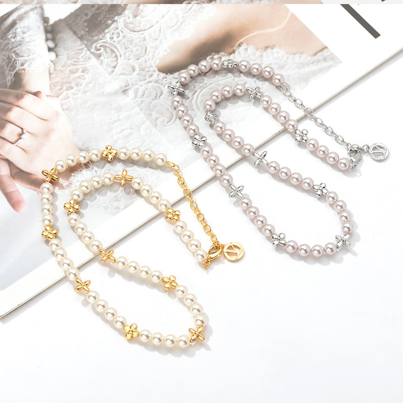 Pearls with a four-leaf clover necklace