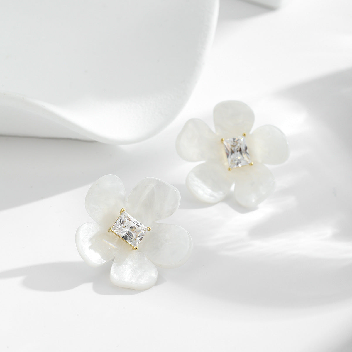 Pearlized White Acrylic with Zirconia Flower Earrings