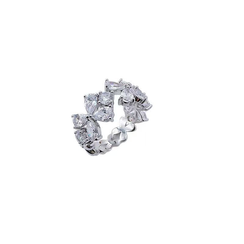 Zirconia four-petal flower open-end ring
