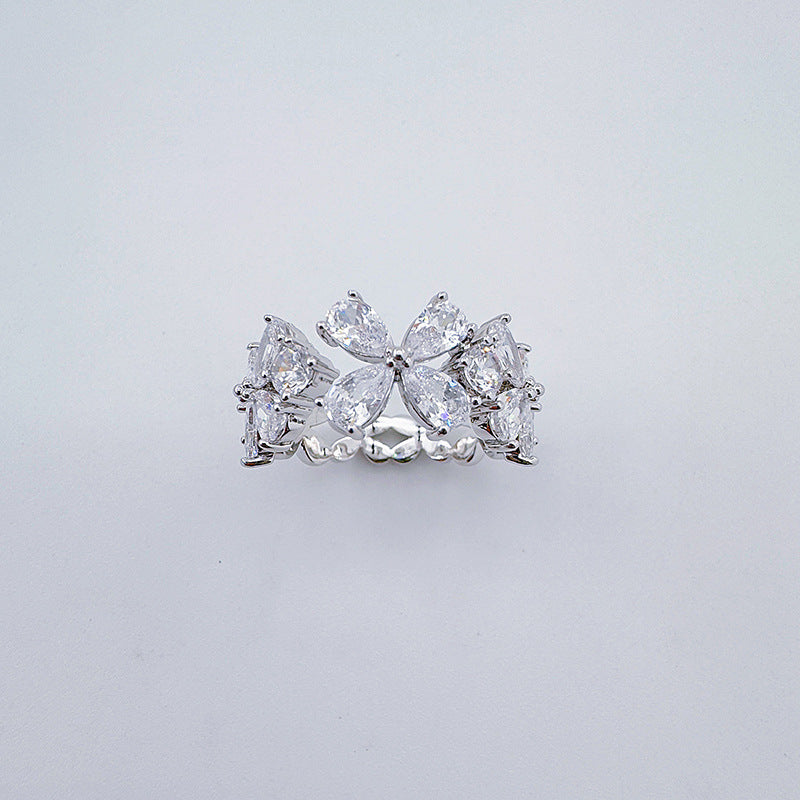 Zirconia four-petal flower open-end ring