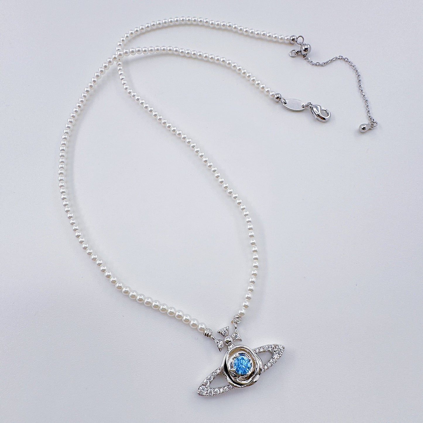 Pearl Saturn with Diamonds Chain