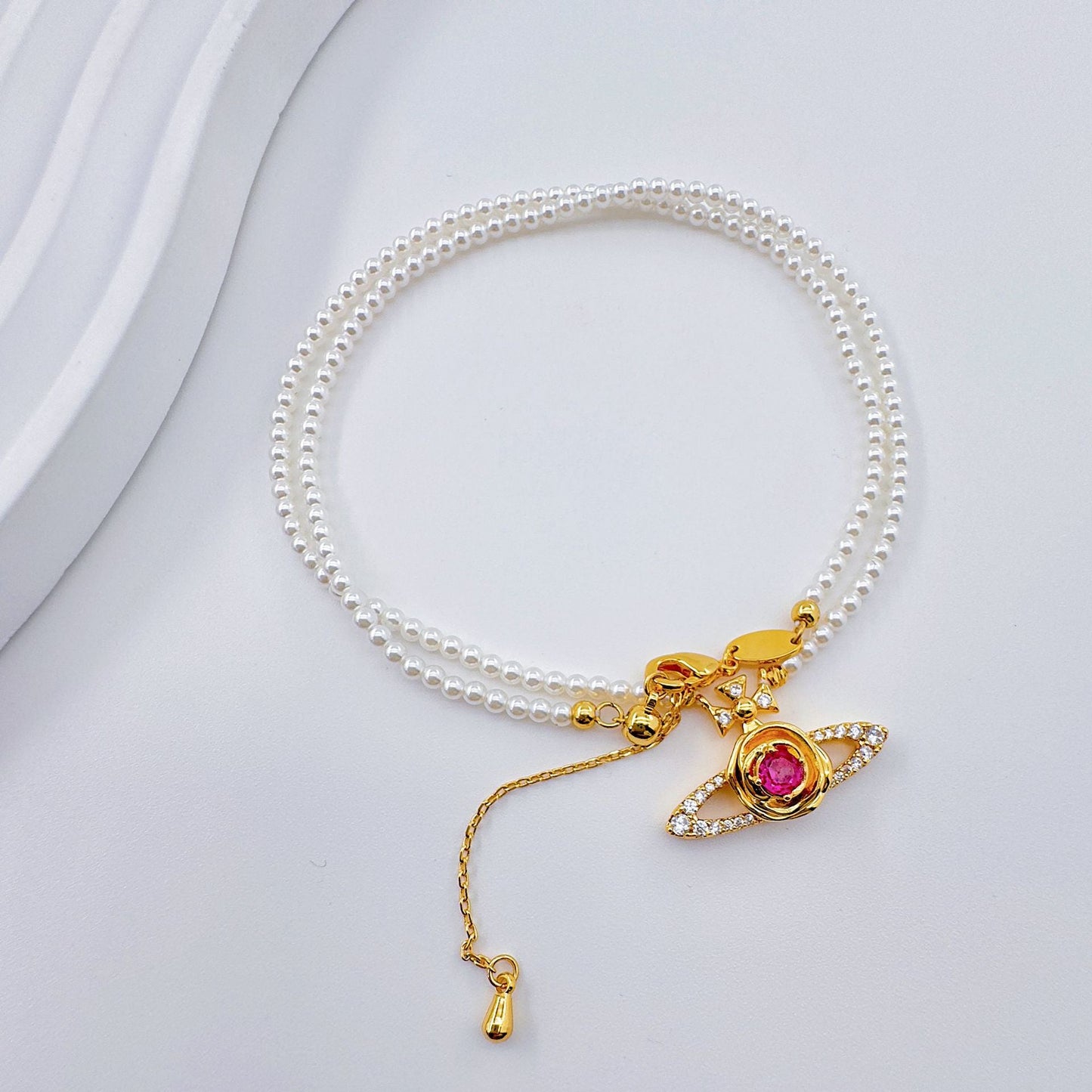 Pearl Saturn with Diamonds Chain