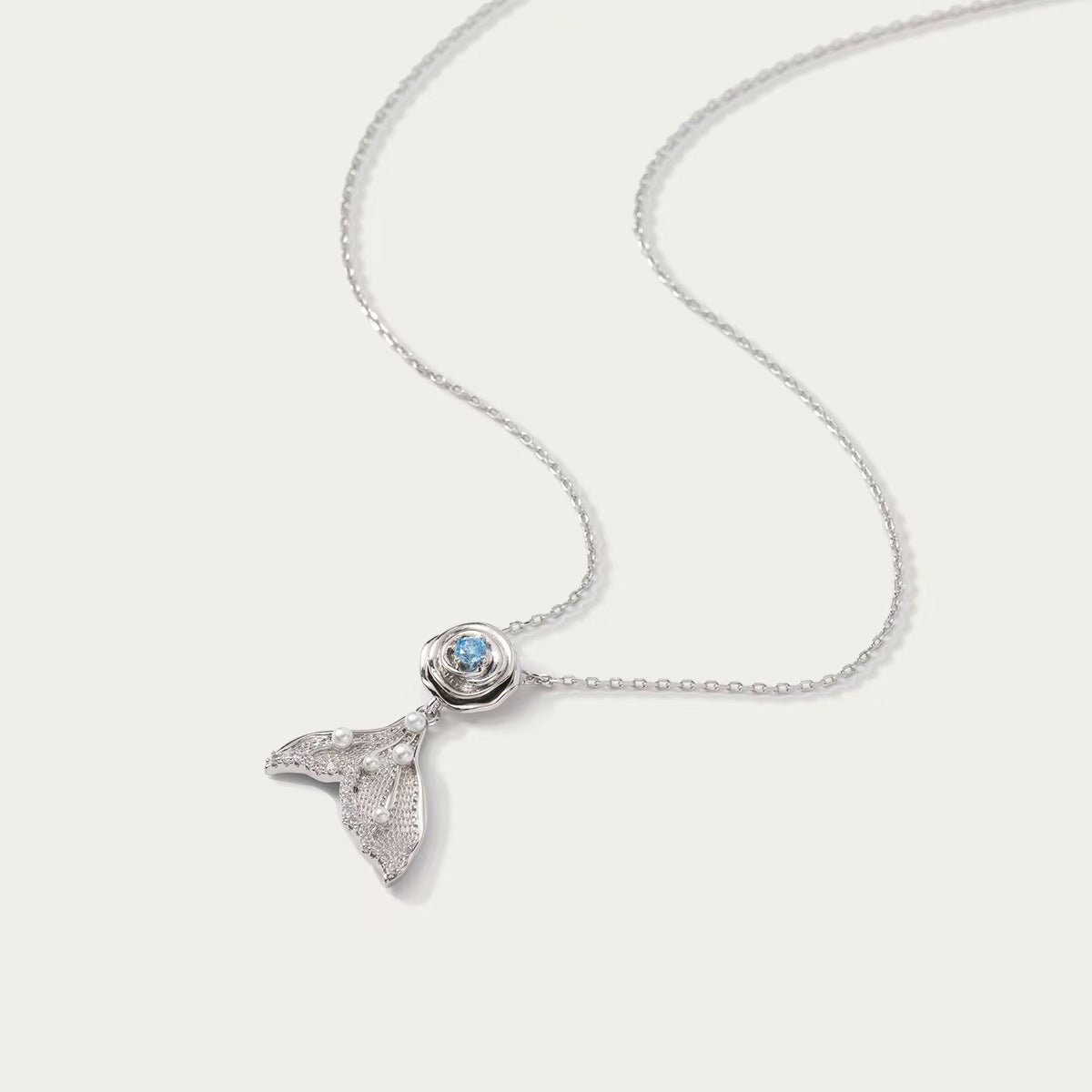 Fishtail pearl and blue zirconia necklace