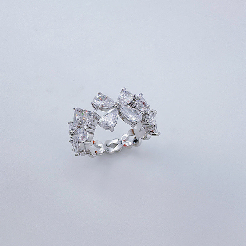 Zirconia four-petal flower open-end ring