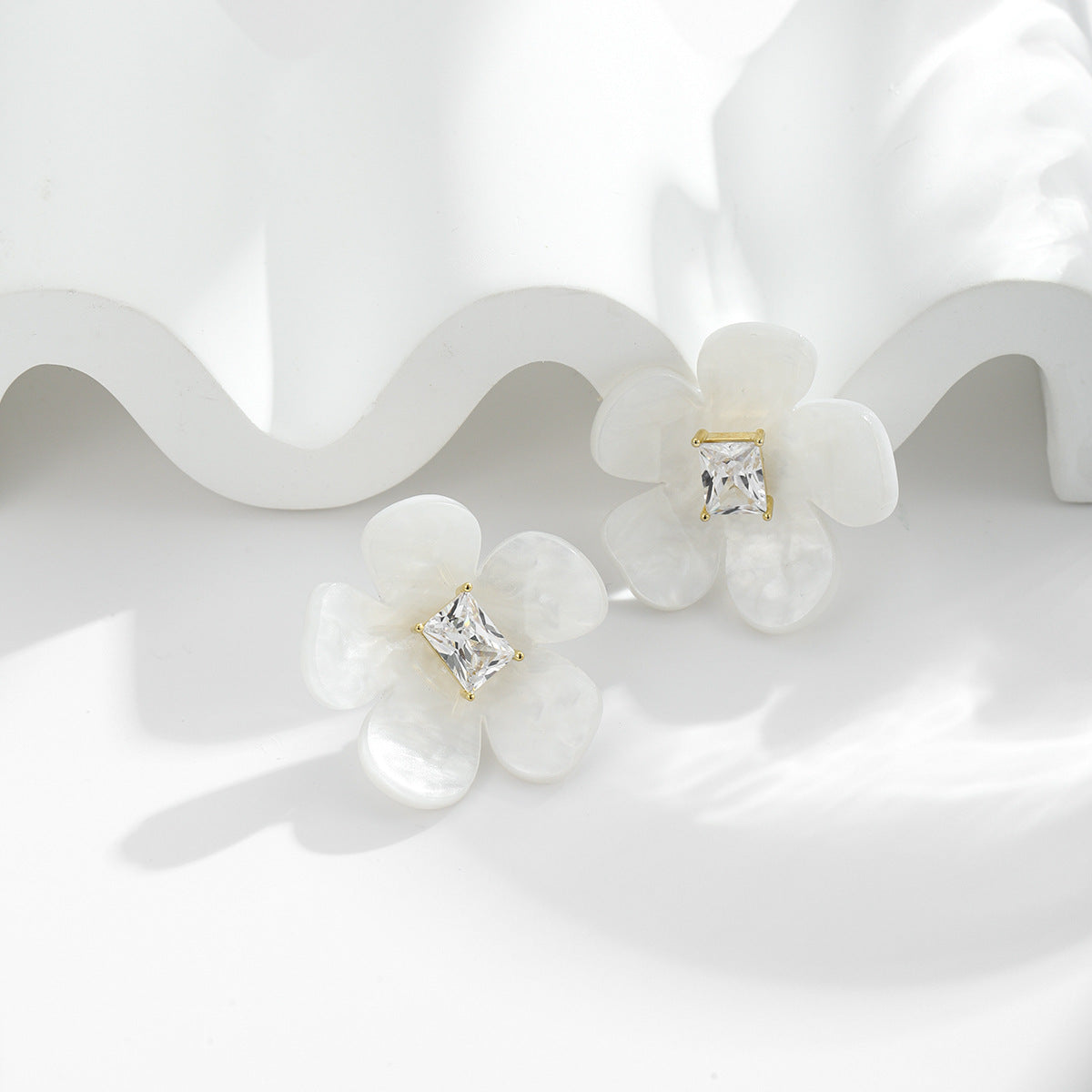 Pearlized White Acrylic with Zirconia Flower Earrings